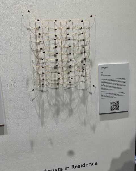 An art piece on the wall.
